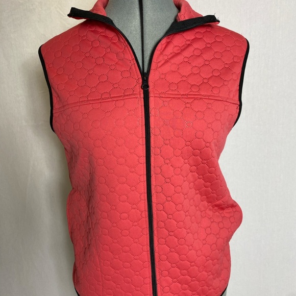 Swing Golf Vest in coral. - Picture 8 of 11